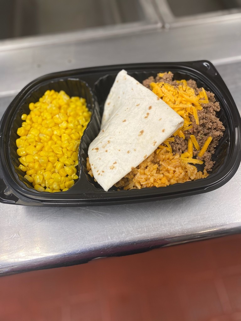 Image of lunch today. Soft taco and rice.